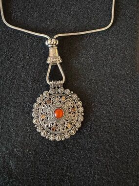 Latasia Silver-Tone Filigree Brooch with Orange Cabochon and Amber Accents